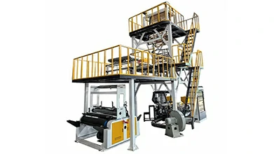 /Why does a two‑layer blown film machine cut material cost by 15%?